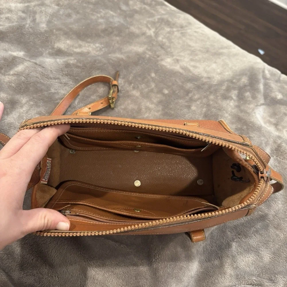 Dooney & Bourke flaws missing